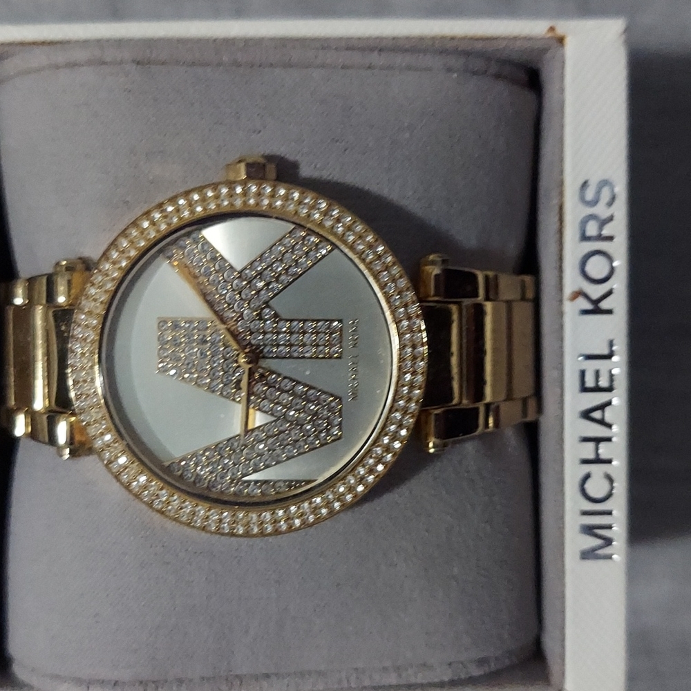 MK gold watch